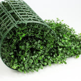 Rolled UV-rated boxwood mat from Silk Plants Canada. Artificial green wall panel.